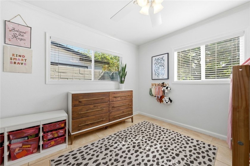 Welcome home to one of the most stylishly designed homes on the - photo 8