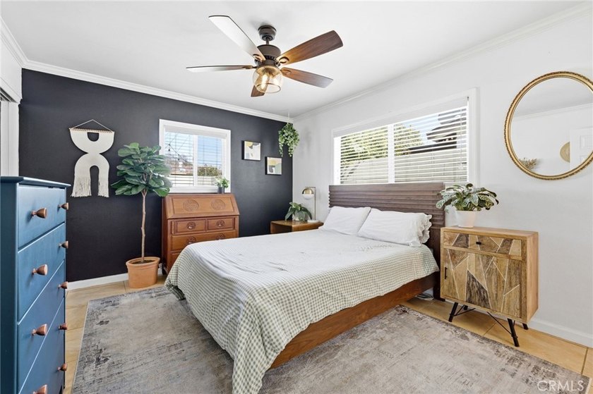 Welcome home to one of the most stylishly designed homes on the - photo 10