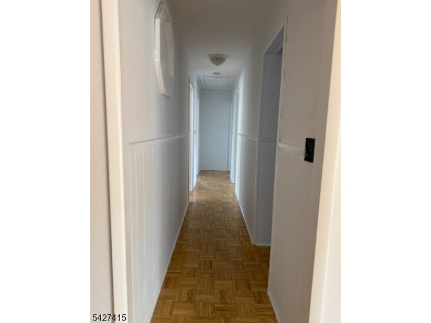 Welcome to this spacious four-bedroom ranch nestled in the - photo 8