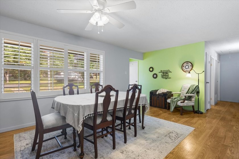 This well-maintained 3-bedroom, 2-bath home is nestled on a - photo 2