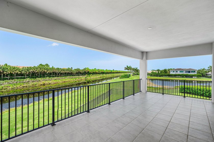 Nestled behind the prestigious gates of Boca Bridges, this - photo 33