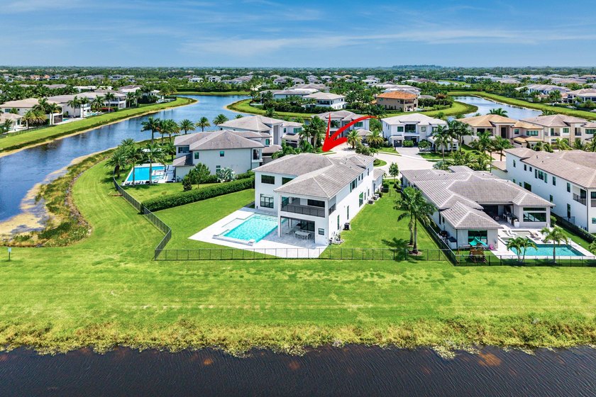 Nestled behind the prestigious gates of Boca Bridges, this - photo 43