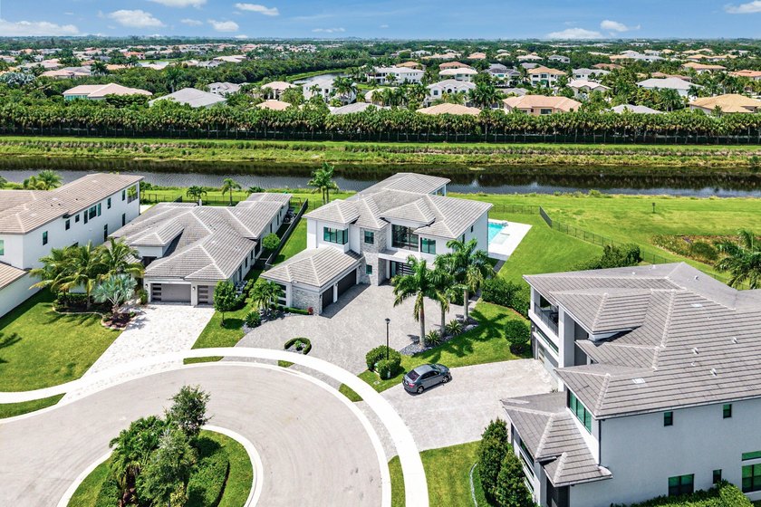 Nestled behind the prestigious gates of Boca Bridges, this - photo 44