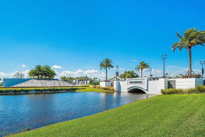 Nestled behind the prestigious gates of Boca Bridges, this - photo 45