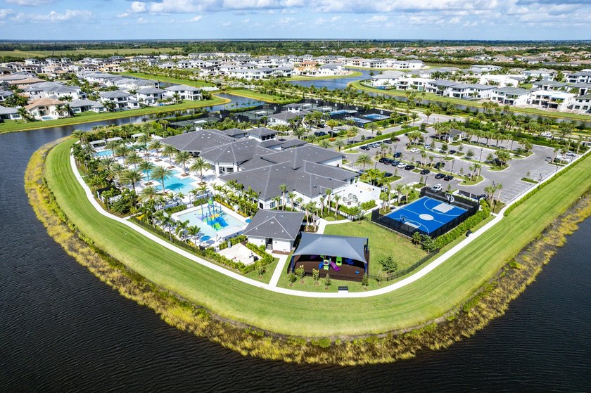 Nestled behind the prestigious gates of Boca Bridges, this - photo 46