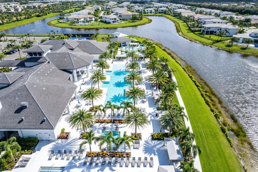 Nestled behind the prestigious gates of Boca Bridges, this - photo 48