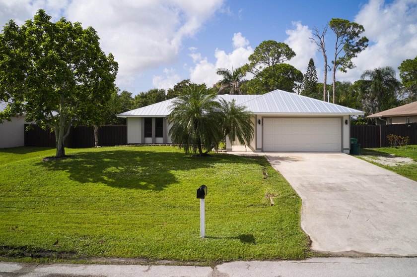 Beautifully renovated and move-in ready, this stunning Port St - photo 19