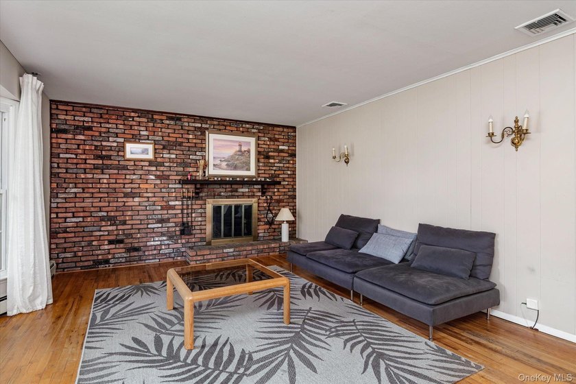 Nestled on a quiet half-acre lot in one of Stony Brook's most - photo 3