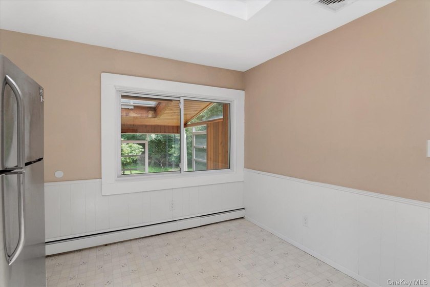 Nestled on a quiet half-acre lot in one of Stony Brook's most - photo 6