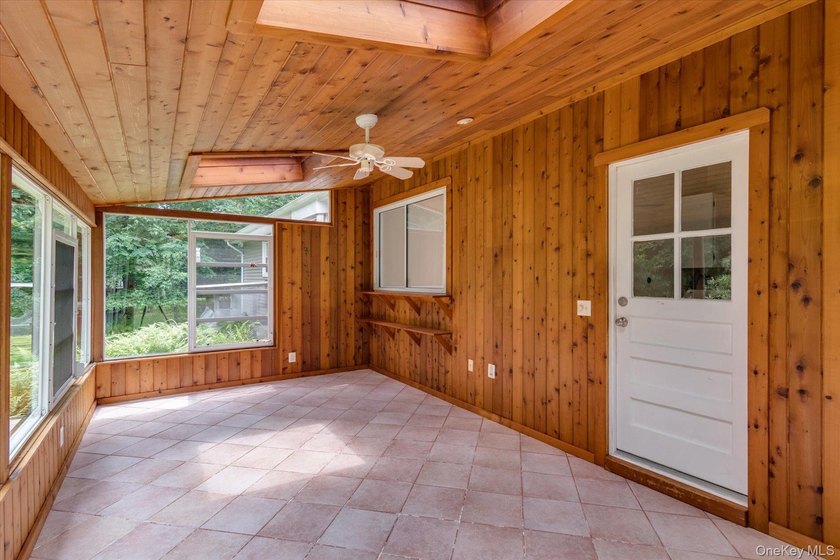 Nestled on a quiet half-acre lot in one of Stony Brook's most - photo 7