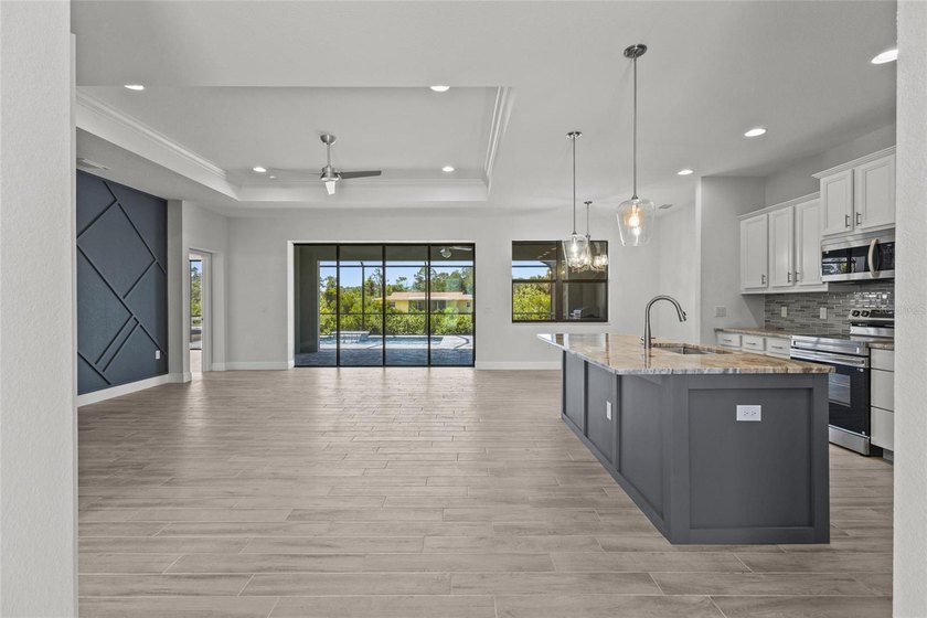 Virtually Staged. WATERFRONT NEW CONSTRUCTION in Gulf Cove - - photo 3