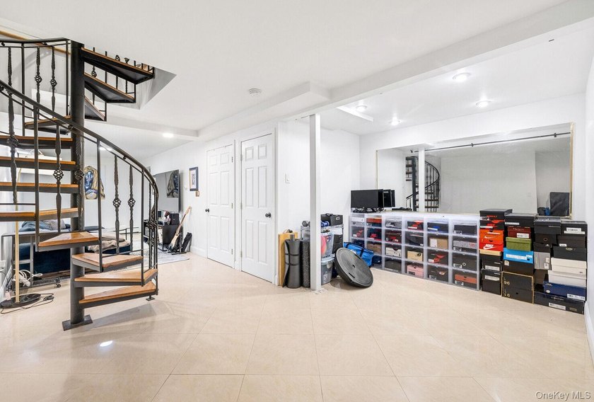 Welcome to 41 Claver Place, a remarkable three-family townhouse - photo 5