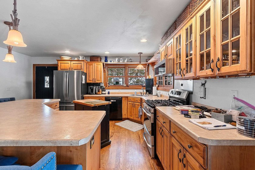 Escape to the Northwoods with this inviting half-log home on - photo 11