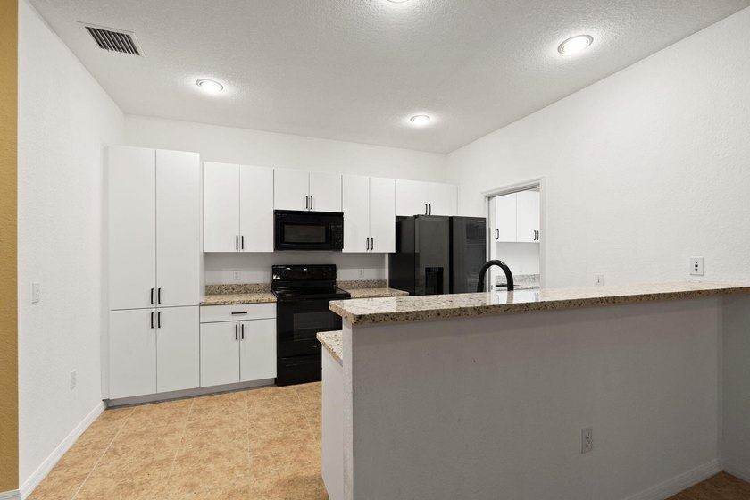 This home is move in ready, conveniently located to the beaches - photo 11