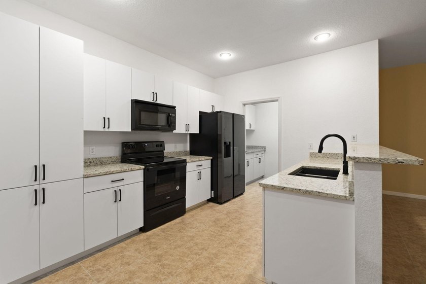 This home is move in ready, conveniently located to the beaches - photo 12