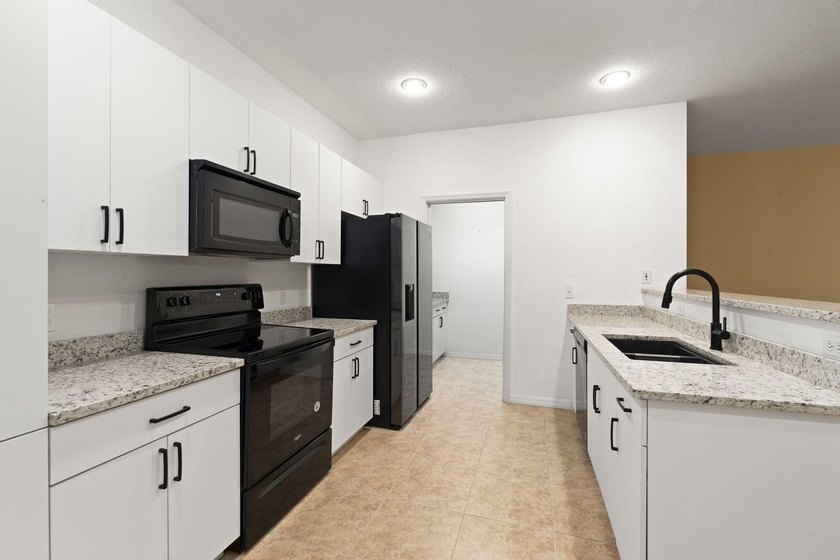 This home is move in ready, conveniently located to the beaches - photo 13