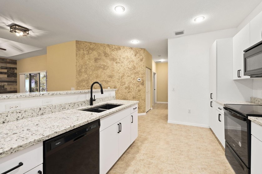 This home is move in ready, conveniently located to the beaches - photo 14