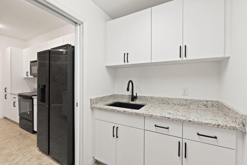 This home is move in ready, conveniently located to the beaches - photo 15