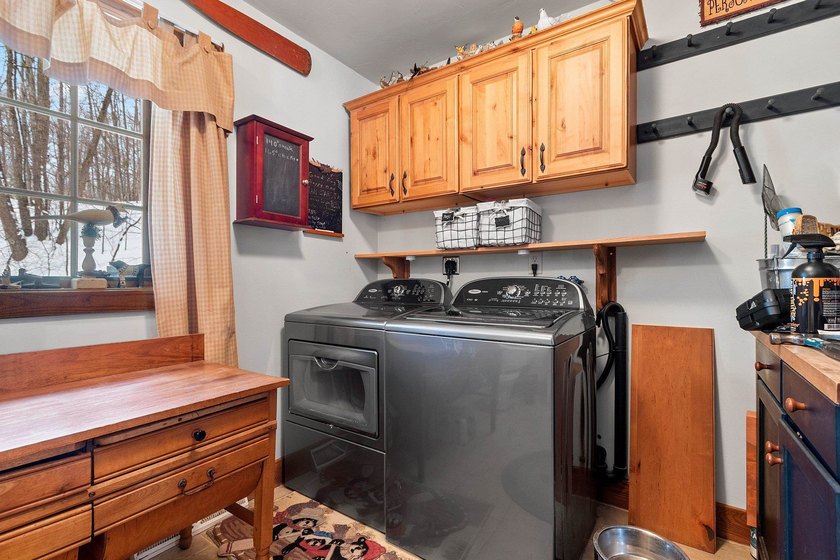 Escape to the Northwoods with this inviting half-log home on - photo 20