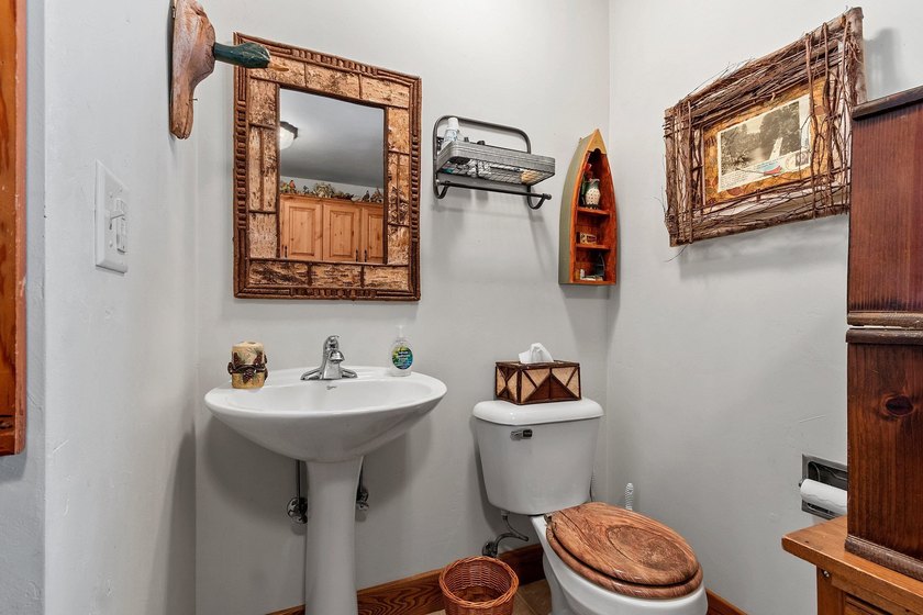 Escape to the Northwoods with this inviting half-log home on - photo 21