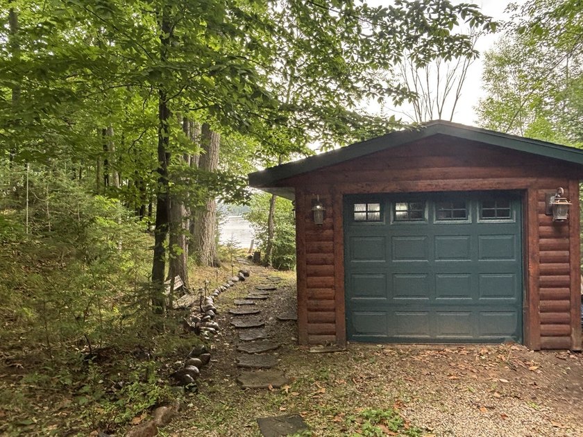 Escape to the Northwoods with this inviting half-log home on - photo 23