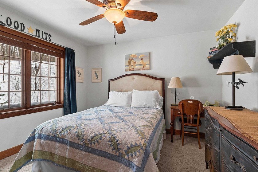 Escape to the Northwoods with this inviting half-log home on - photo 26