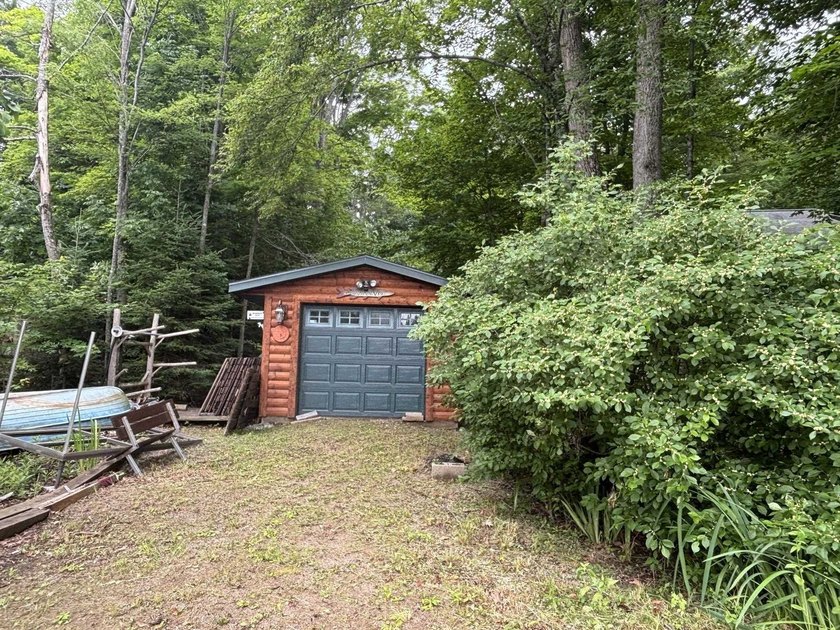 Escape to the Northwoods with this inviting half-log home on - photo 30