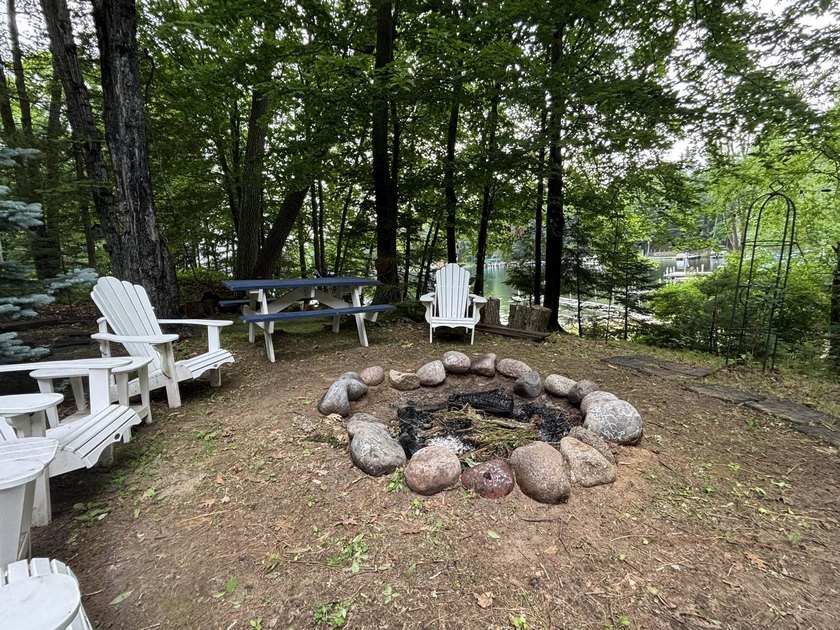 Escape to the Northwoods with this inviting half-log home on - photo 36