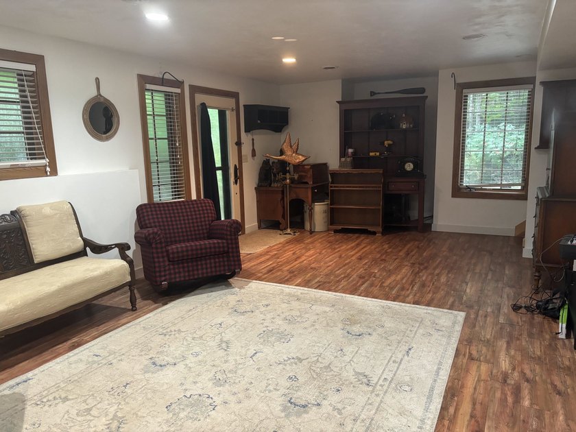 Escape to the Northwoods with this inviting half-log home on - photo 38