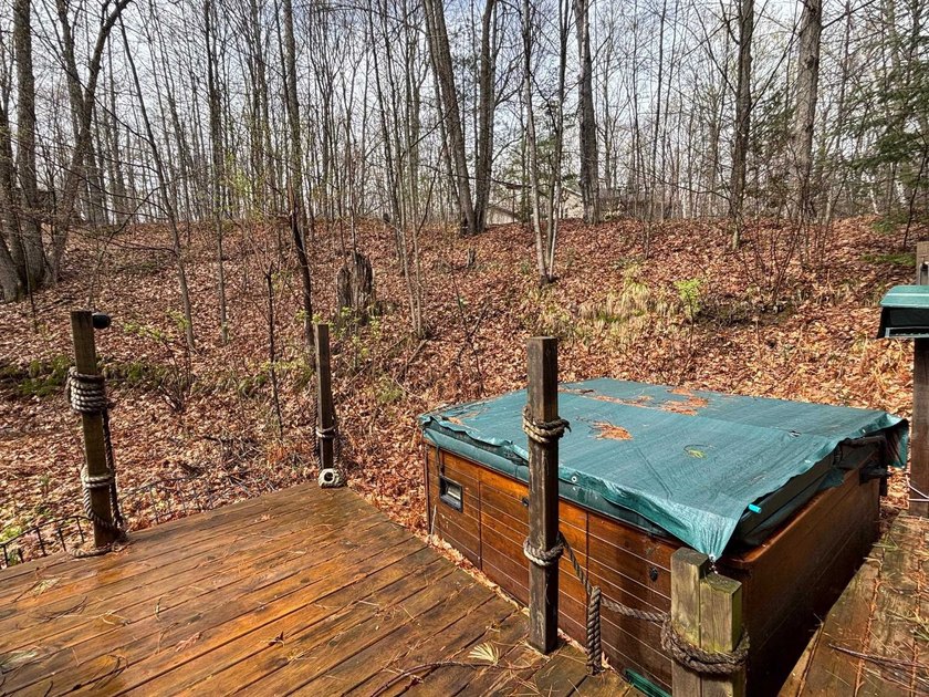 Escape to the Northwoods with this inviting half-log home on - photo 45