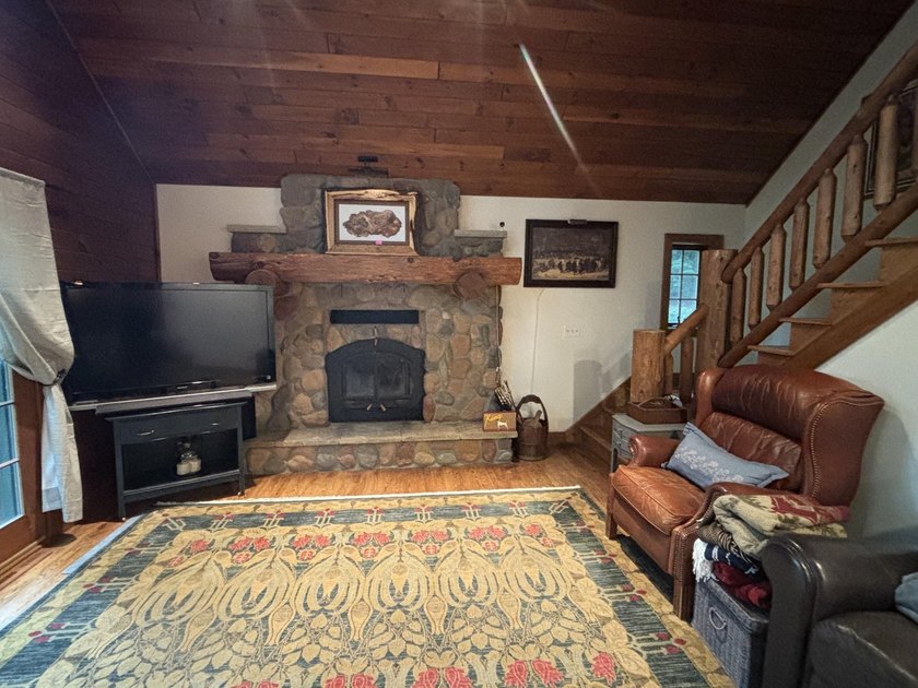 Escape to the Northwoods with this inviting half-log home on - photo 46