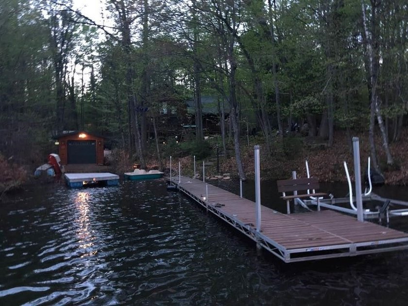 Escape to the Northwoods with this inviting half-log home on - photo 48
