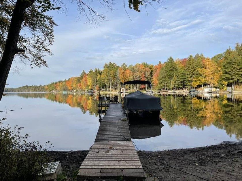Escape to the Northwoods with this inviting half-log home on - photo 49