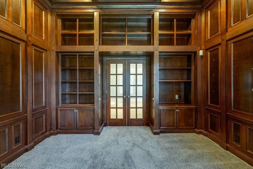 Step into an extraordinary two-story foyer where timeless - photo 10