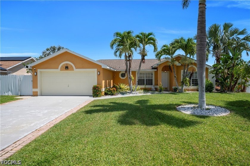 Welcome to this beautifully maintained 4-bedroom, 2-bathroom - photo 3