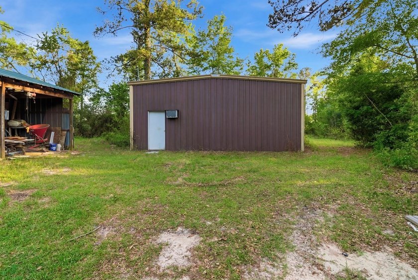 Nestled on approximately 36.5 acres in Gordon, Alabama, this - photo 39