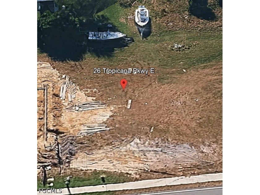Cleared vacant lot with City water and Sewer is ready for your - photo 3