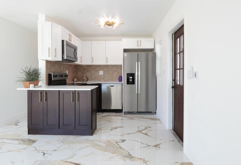 Step into a home where *renovated* is an understatement-it's - photo 3