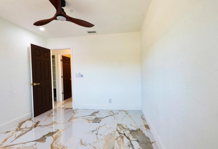 Step into a home where *renovated* is an understatement-it's - photo 6