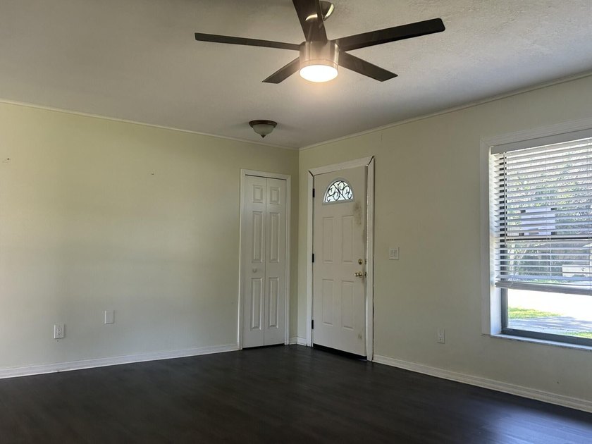 Discover this solid 2-bedroom, 2-bath CBS home with a 1-car - photo 3