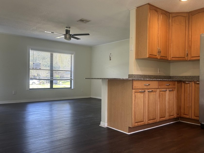 Discover this solid 2-bedroom, 2-bath CBS home with a 1-car - photo 7