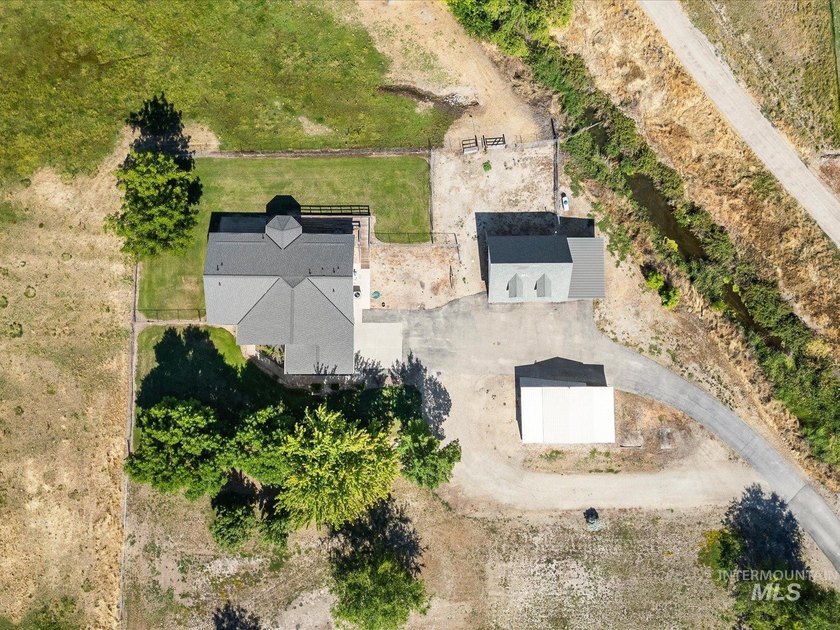 Nestled at the base of Emmett's desirable southeast hills, this - photo 36
