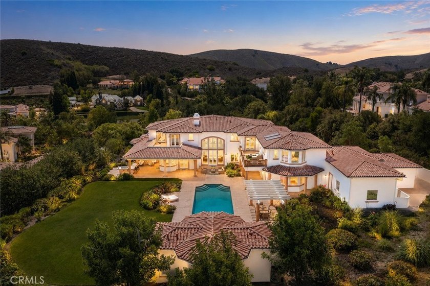 Nestled within the prestigious North Ranch Country Club Estates - photo 5