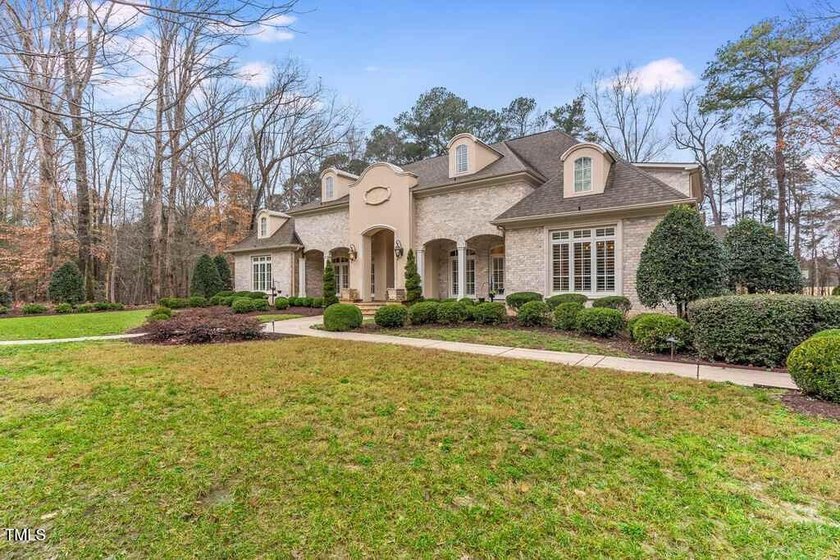 This exceptional custom luxury estate home was built by Wayne - photo 3