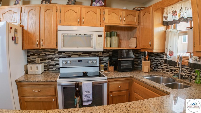Stunning turnkey waterfront retreat on Lake of the Ozarks! This - photo 13