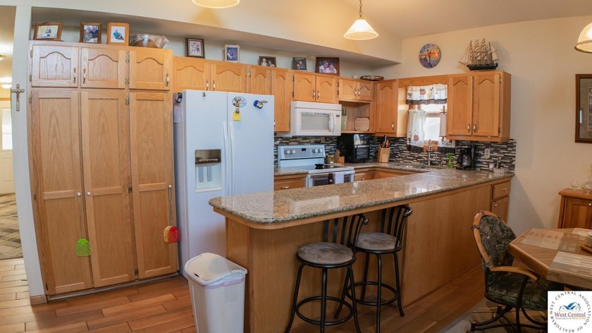 Stunning turnkey waterfront retreat on Lake of the Ozarks! This - photo 18