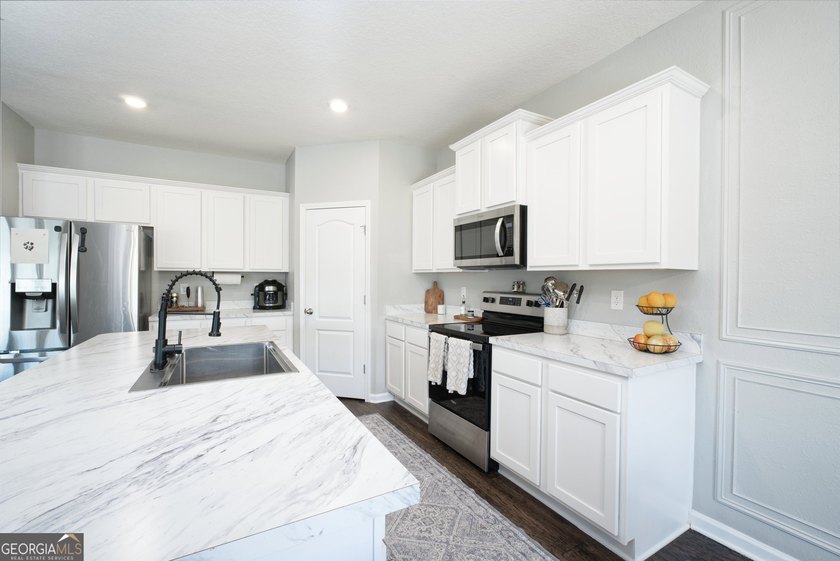 Welcome home to this beautifully maintained two-story residence - photo 14