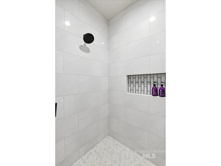 Experience this custom-built 3-bedroom, 2.5-bath home with a - photo 18