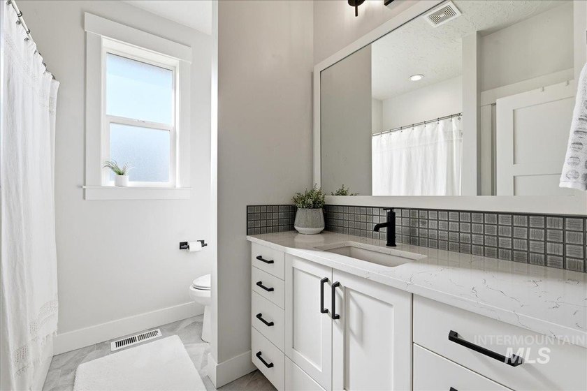 Experience this custom-built 3-bedroom, 2.5-bath home with a - photo 21