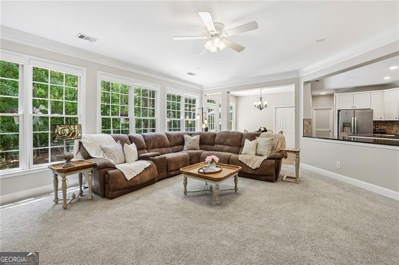 Welcome home to 6930 Olde Atlanta Parkway, where refined living - photo 17